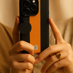 iPhone 14 Pro Luxury Leather Case – Dual Line Design, Metal Camera Ring, Soft Inner Lining, MagSafe Compatible (Black & Orange)