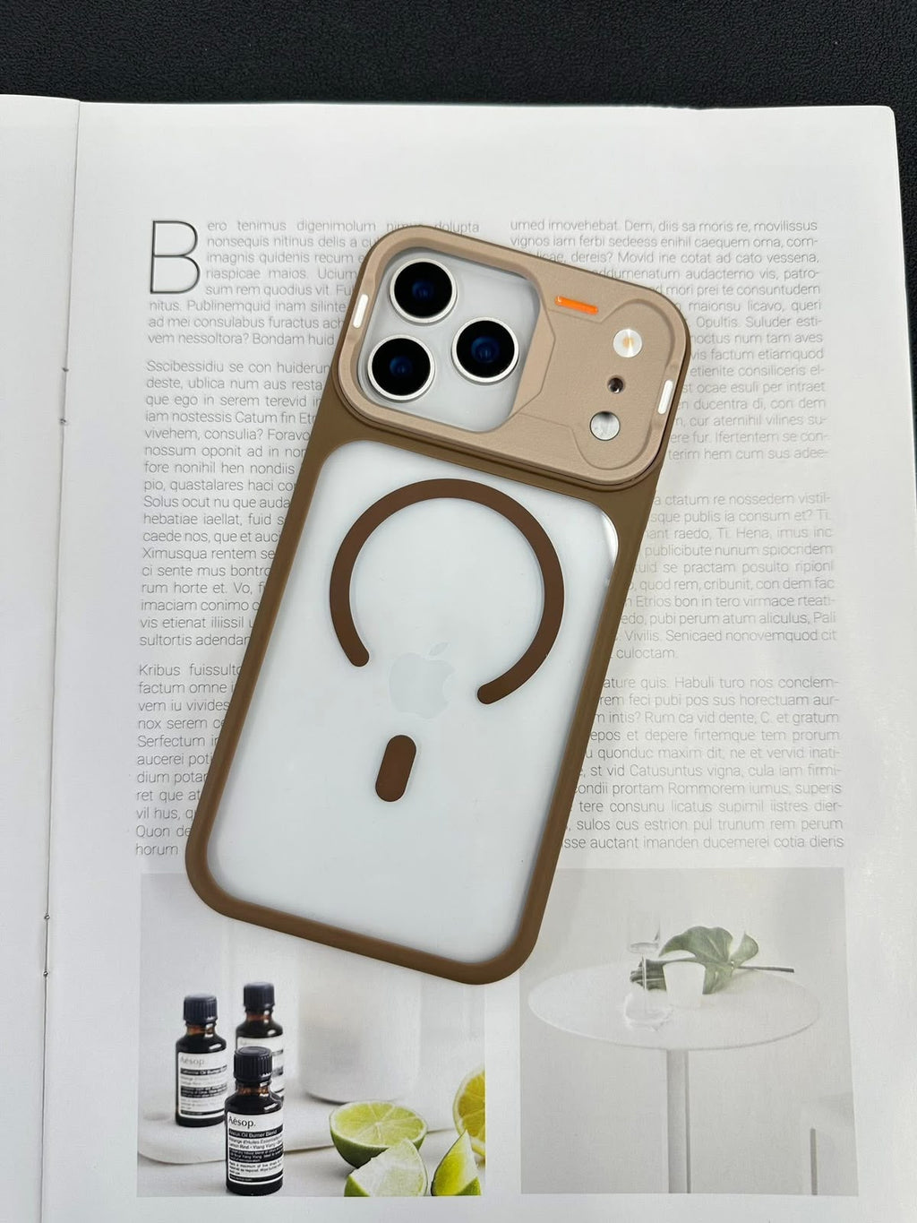 iPhone 17 Pro Max clear case with beige frame, MagSafe ring and raised camera guard