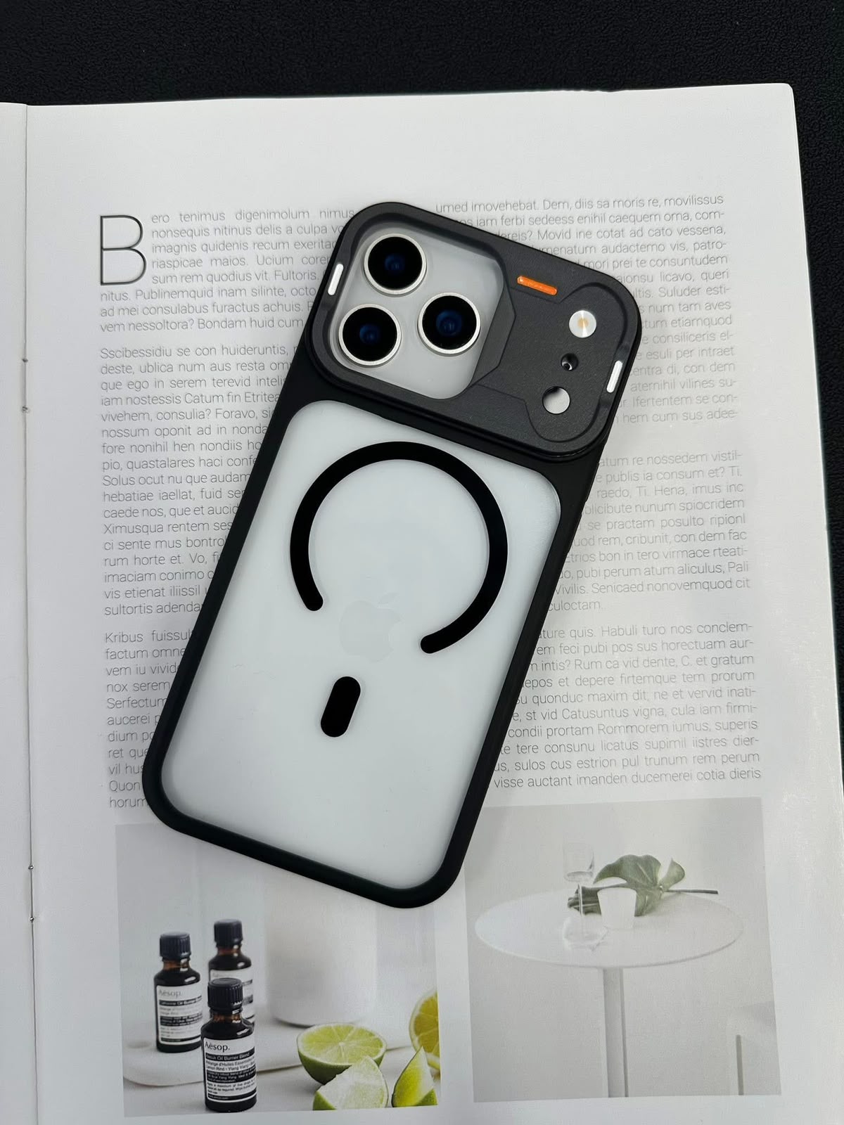 iPhone 17 Pro Max clear case with black frame, MagSafe ring and raised camera guard