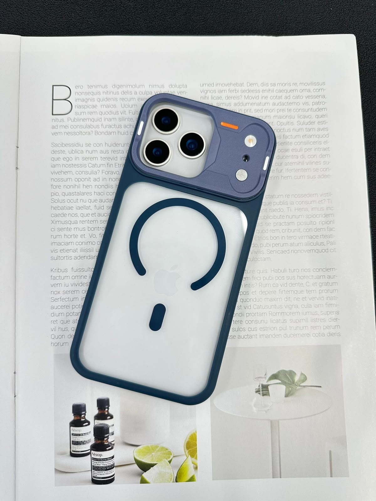 iPhone 17 Pro clear case with blue frame, MagSafe ring and raised camera guard