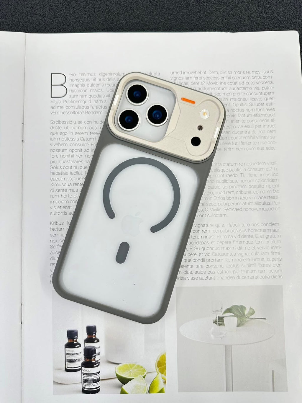 iPhone 17 Pro Max clear case with grey frame, MagSafe ring and raised camera guard