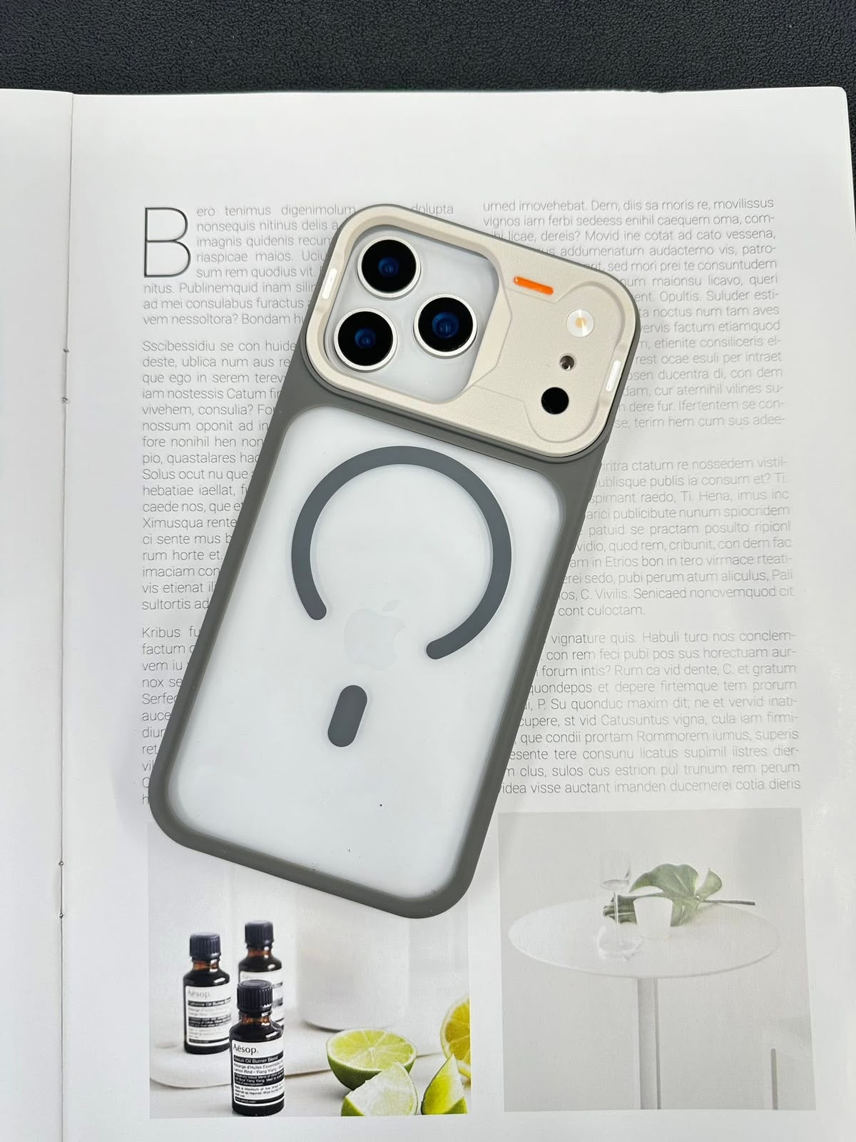 iPhone 17 Pro clear case with grey frame, MagSafe ring and raised camera guard